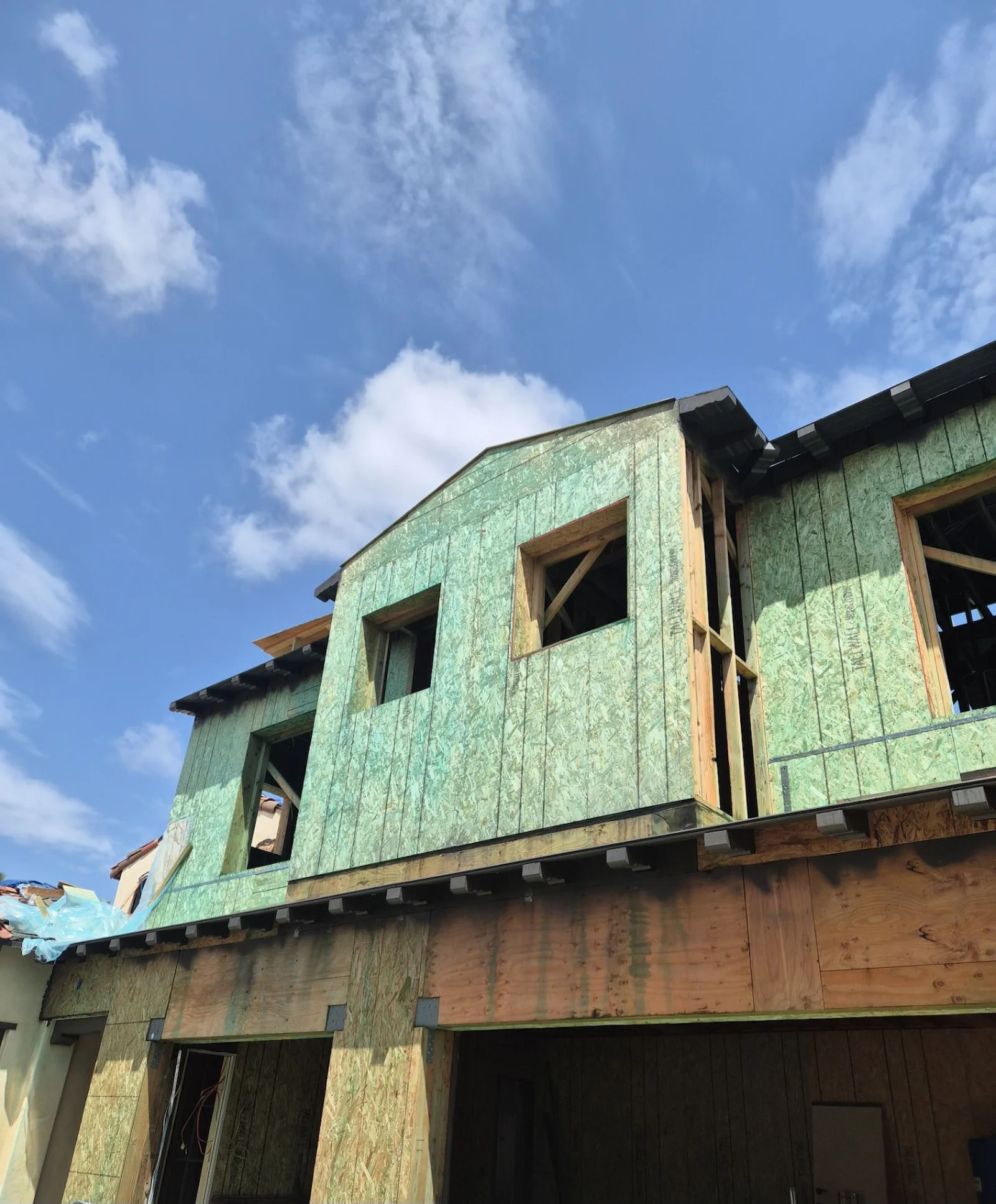 WRP Board Defense applied to exposed wood framing on a residential home addition before the structure is enclosed